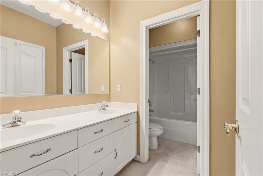 2393 Union Grove Road Lexington, NC 27295 - Photo 15 of 37 Hall Bathroom with double sinks