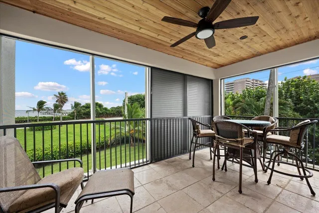 a bedroom with a bed and a chair