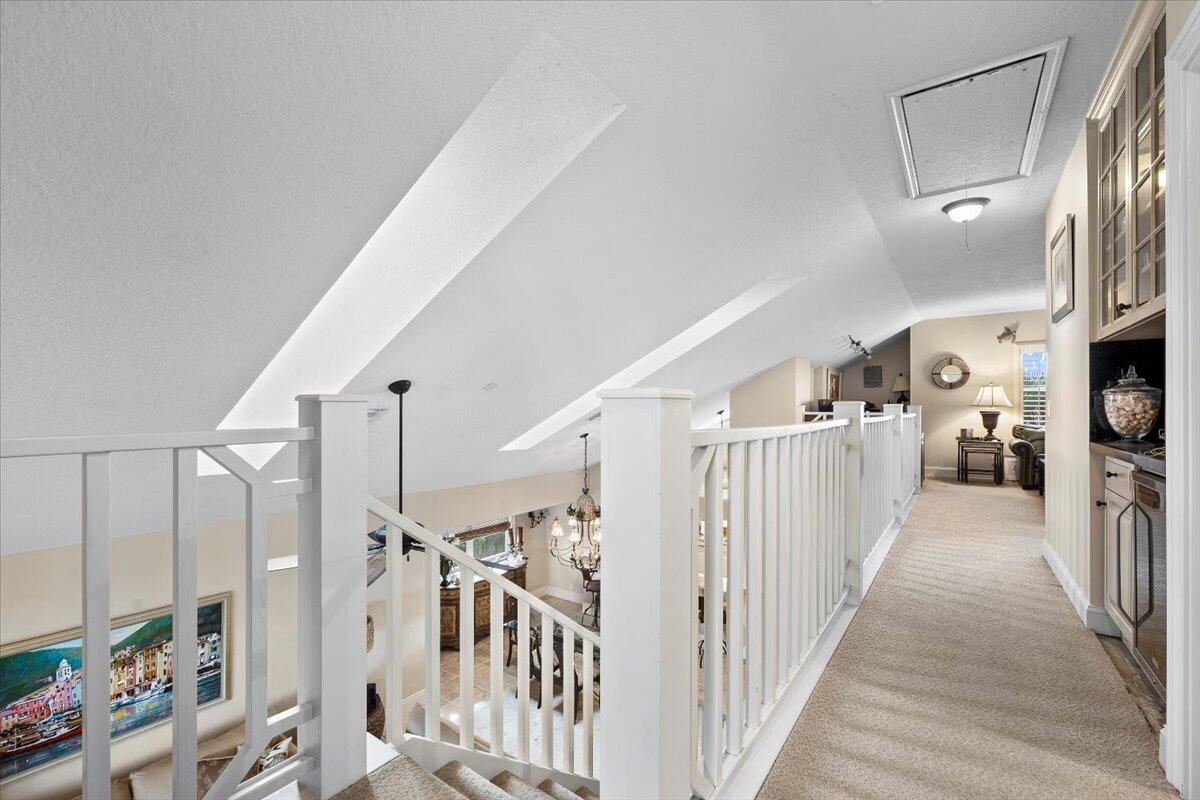 4161 U.S. Highway 1, Unit N3 Jupiter, FL 33477 - Photo 21 of 43 a view of a hallway with a livingroom and entryway