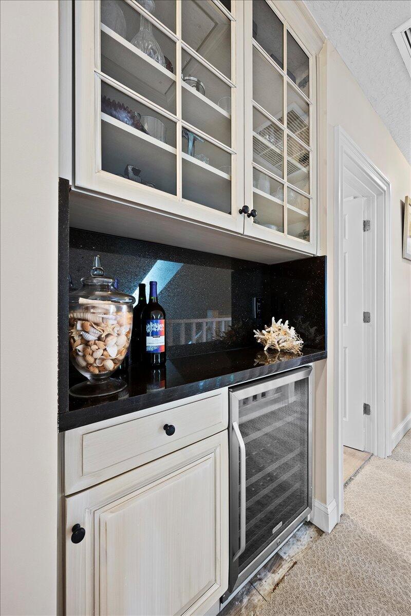 4161 U.S. Highway 1, Unit N3 Jupiter, FL 33477 - Photo 22 of 43 a kitchen with a stove and a microwave