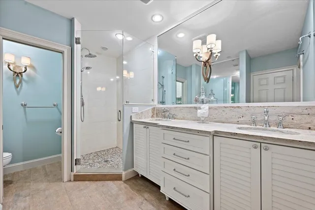 a view of entryway with wooden floor and stairs