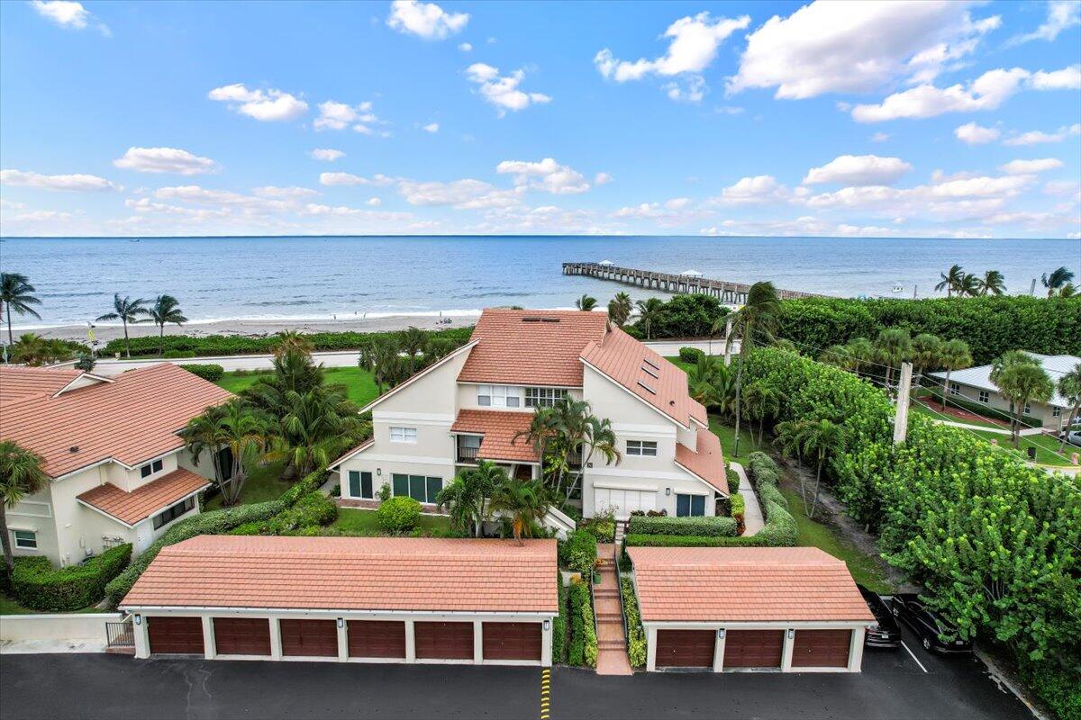 4161 U.S. Highway 1, Unit N3 Jupiter, FL 33477 - Photo 34 of 43 an aerial view of a house with garden space and ocean view