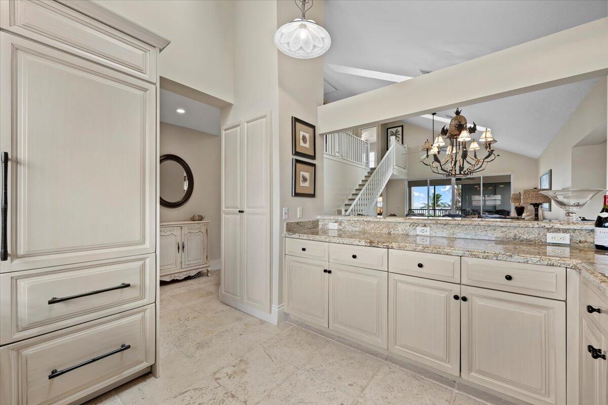 4161 U.S. Highway 1, Unit N3 Jupiter, FL 33477 - Photo 5 of 43 a spacious bathroom with double sink and a mirror