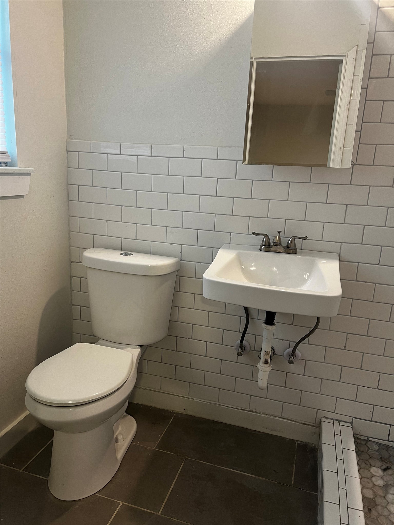 2514 West 12th Street, Unit A Austin, TX 78703 - Photo 3 of 8 a bathroom with a toilet and a sink