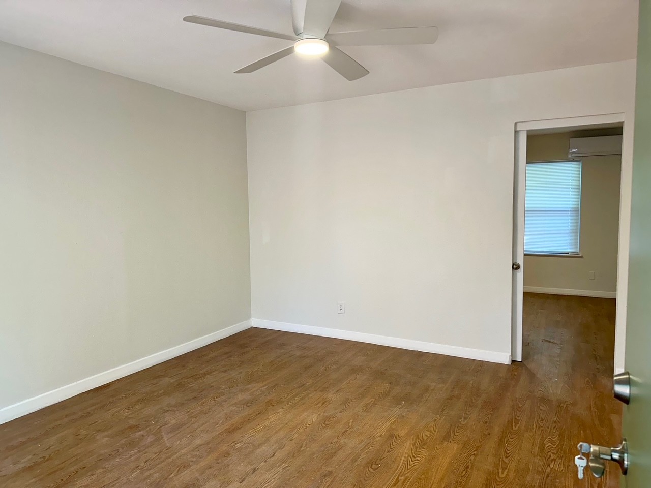 2514 West 12th Street, Unit A Austin, TX 78703 - Photo 8 of 8 wooden floor in an empty room