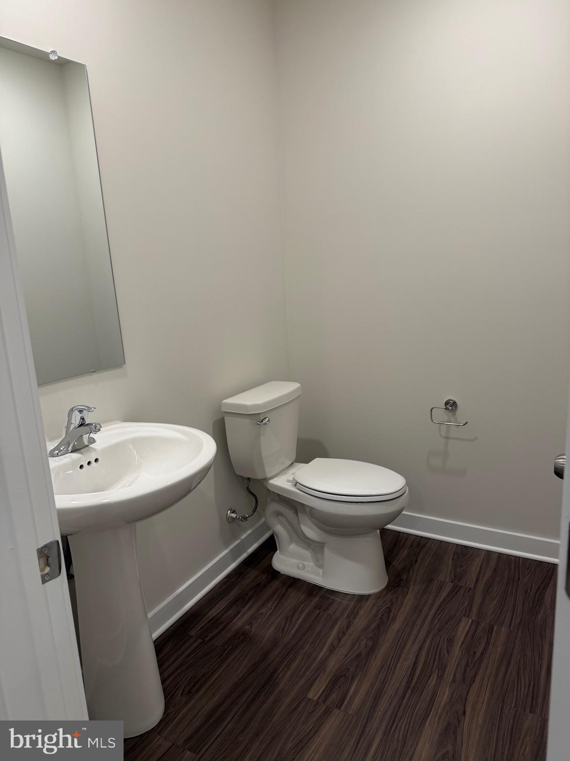 7 Moran Place Bridgeport, PA 19405 - Photo 11 of 40 a white toilet sitting next to a bathroom sink