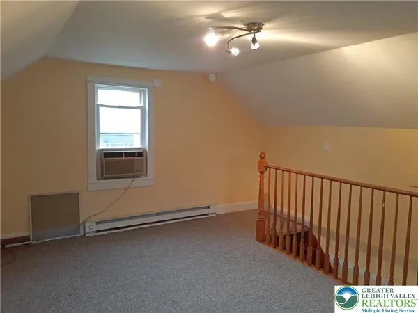 a view of a livingroom with a staircase
