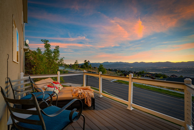 14883 Tooele Lane Draper, UT 84020 - Photo 46 of 49 Spacious outdoor deck featuring composite decking, cable railing, and distant mountain scenery