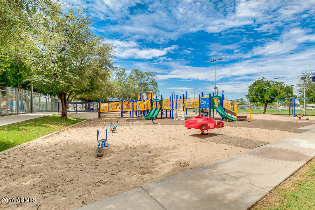 2145 East Center Lane, Unit 2 Tempe, AZ 85281 - Photo 16 of 20 a view of a park with swings and slides