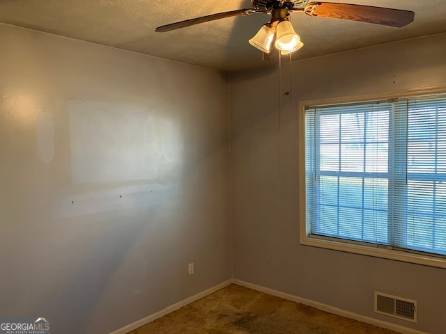 104 Dungeness Road Griffin, GA 30224 - Photo 19 of 36 a view of empty room with window