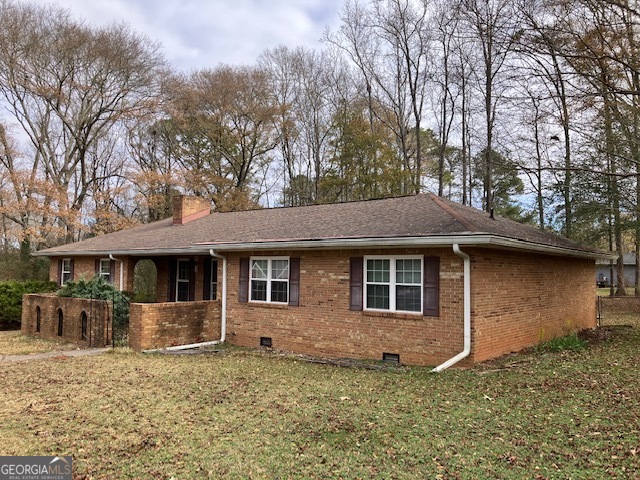 104 Dungeness Road Griffin, GA 30224 - Photo 2 of 36 a front view of a house with garden