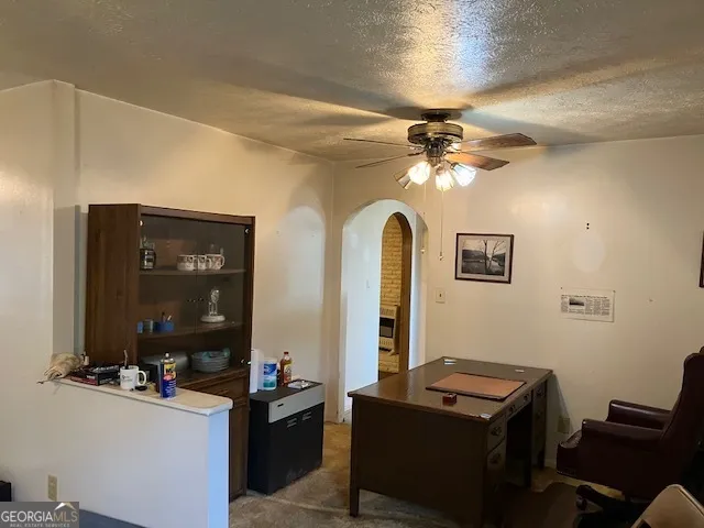 a room with furniture and a mirror