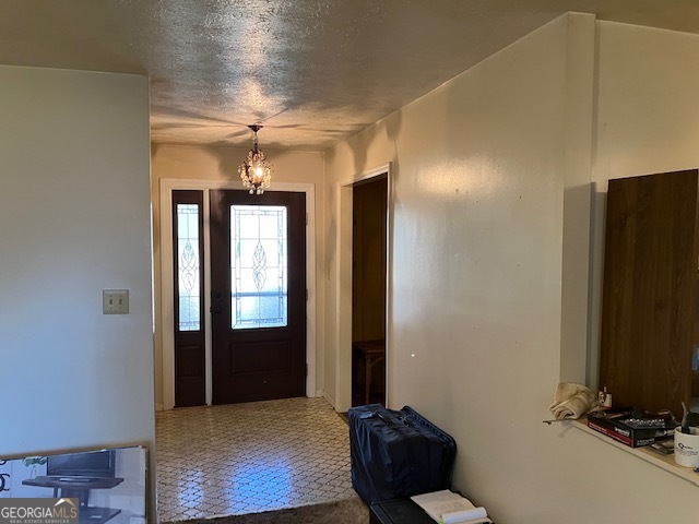 104 Dungeness Road Griffin, GA 30224 - Photo 24 of 36 a view of a room with gym equipment