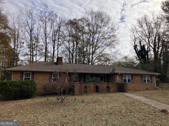 104 Dungeness Road Griffin, GA 30224 - Photo 25 of 36 a front view of a house with garden