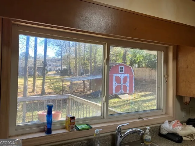 a room with lots of furniture and windows