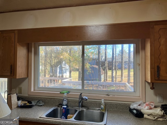 104 Dungeness Road Griffin, GA 30224 - Photo 29 of 36 a kitchen with a sink and large window