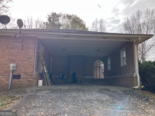 a front view of a house with large space