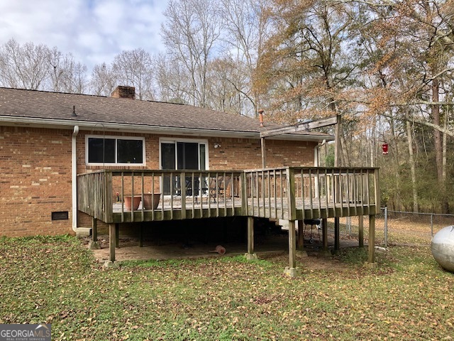 104 Dungeness Road Griffin, GA 30224 - Photo 5 of 36 a view of a chair and table in the balcony