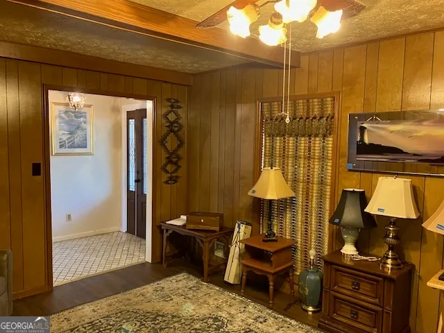 a bedroom with a bed and a table