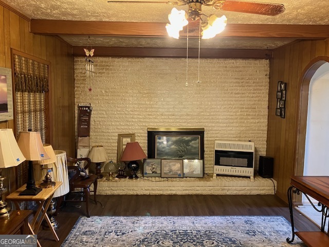 104 Dungeness Road Griffin, GA 30224 - Photo 9 of 36 a living room with furniture and a fireplace