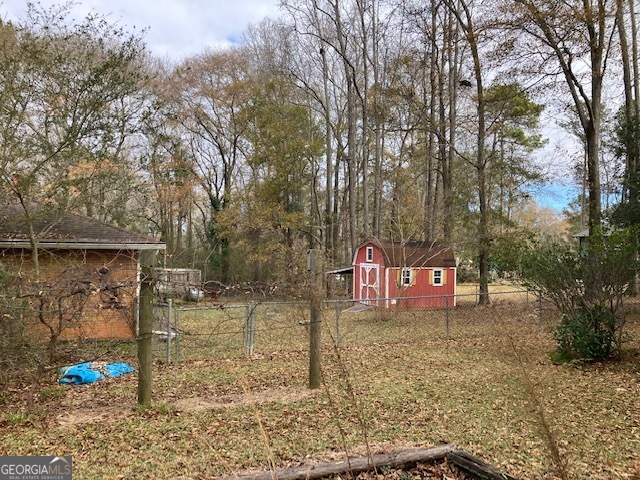 104 Dungeness Road Griffin, GA 30224 - Photo 10 of 36 a sign that is on the side of the road