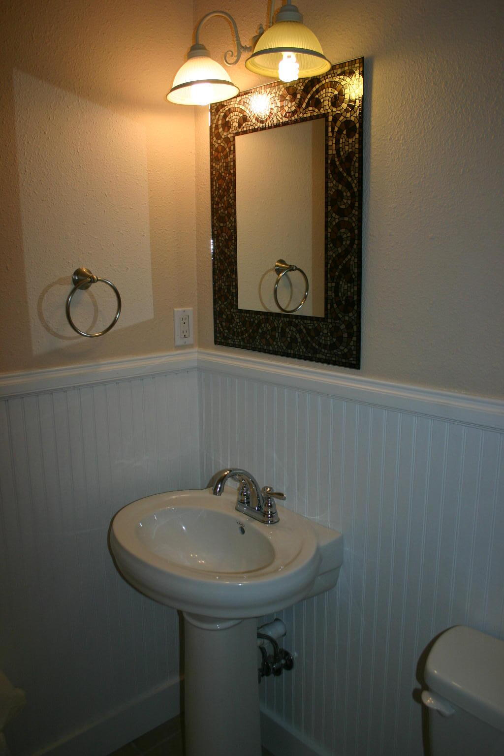 168 Ridge Lake Road Crestview, FL 32536 - Photo 13 of 28 a bathroom with a sink and mirror