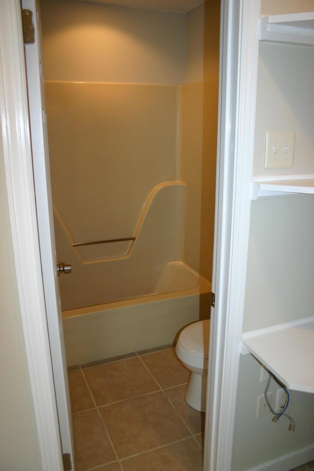 168 Ridge Lake Road Crestview, FL 32536 - Photo 18 of 28 a bathroom with a bathtub and toilet