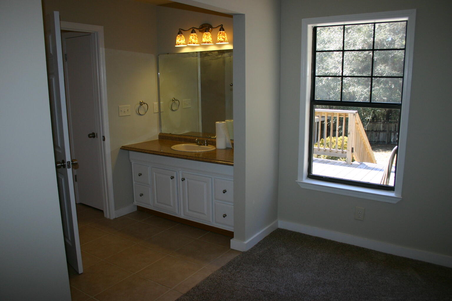 168 Ridge Lake Road Crestview, FL 32536 - Photo 19 of 28 an entryway with a window and a mirror
