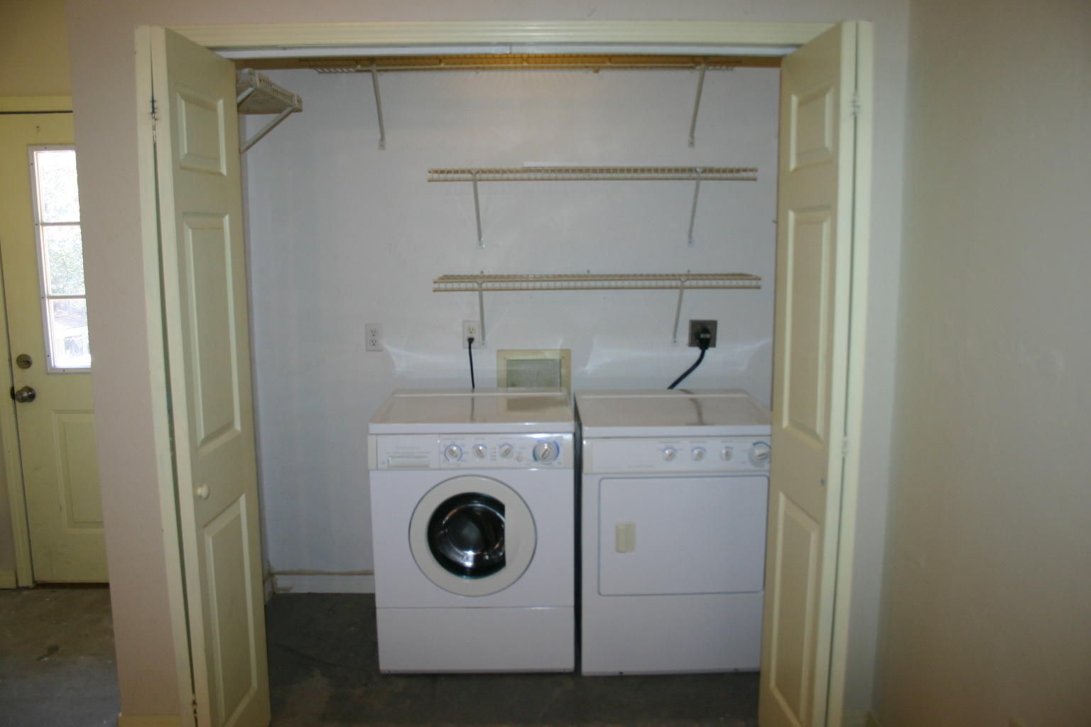 168 Ridge Lake Road Crestview, FL 32536 - Photo 24 of 28 a utility room with dryer and washer