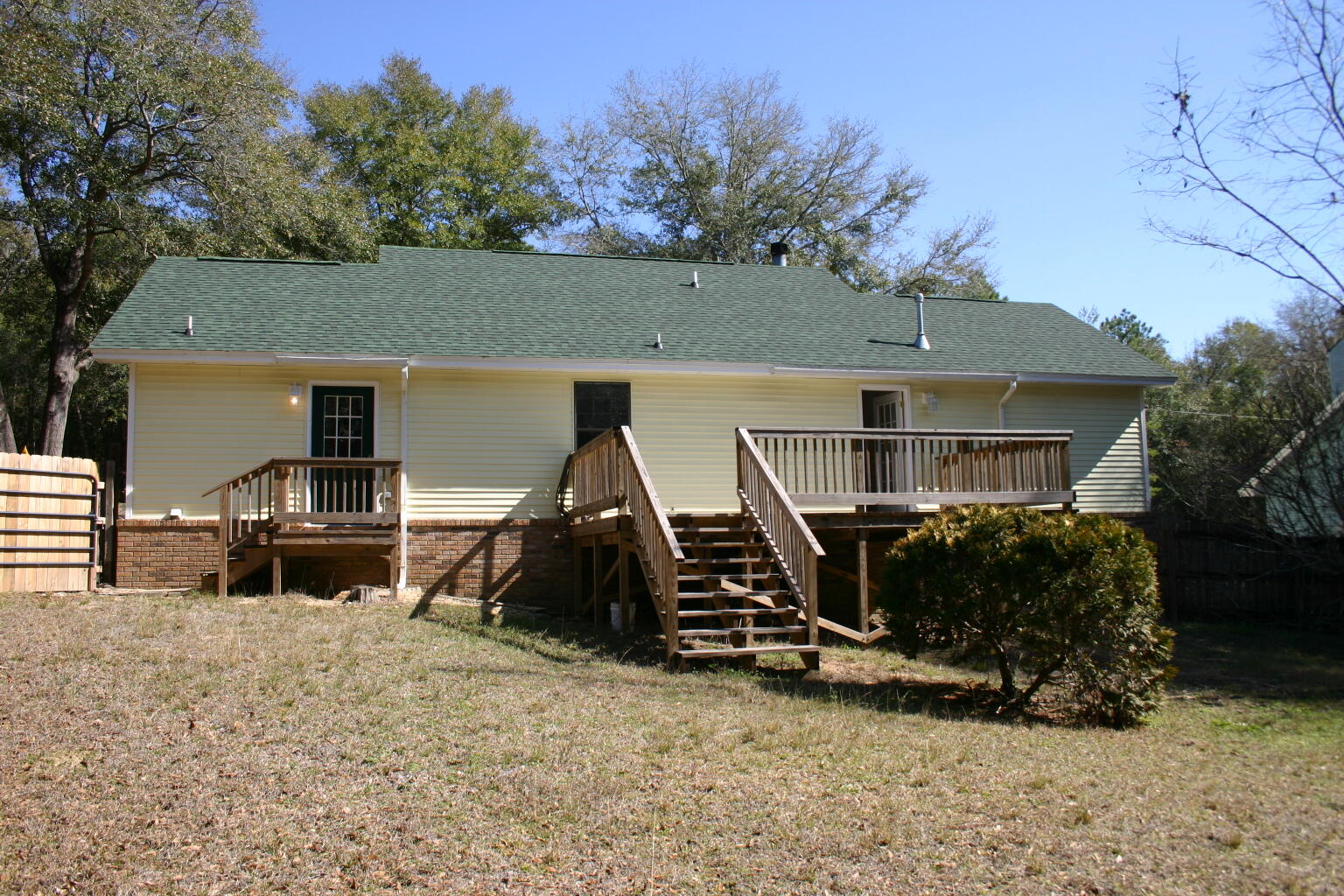 168 Ridge Lake Road Crestview, FL 32536 - Photo 27 of 28 a view of house with outdoor seating area