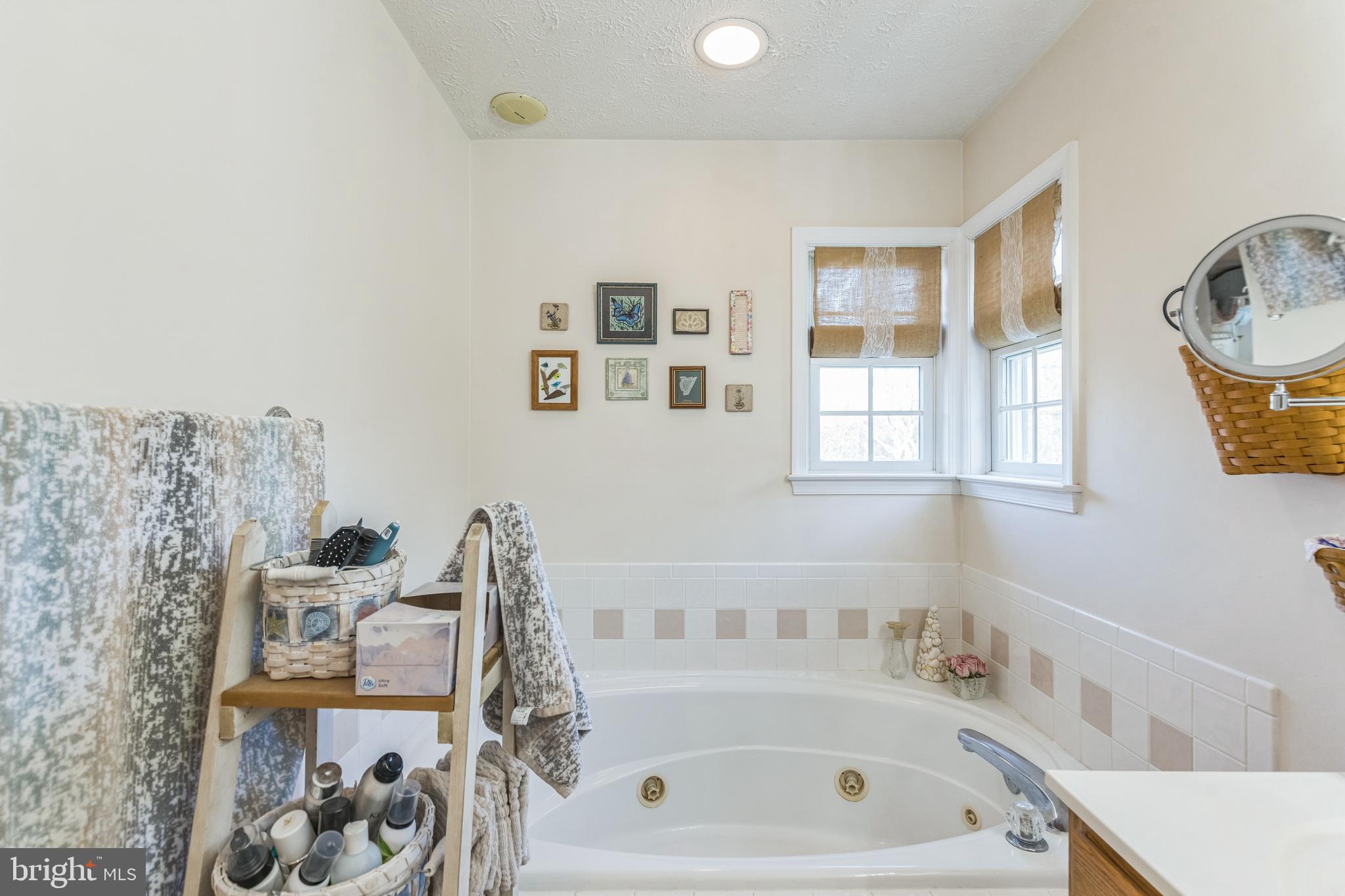 2734 Old Fort Schoolhouse Road Westminster, MD 21157 - Photo 21 of 44 a bathroom with a bathtub and a window