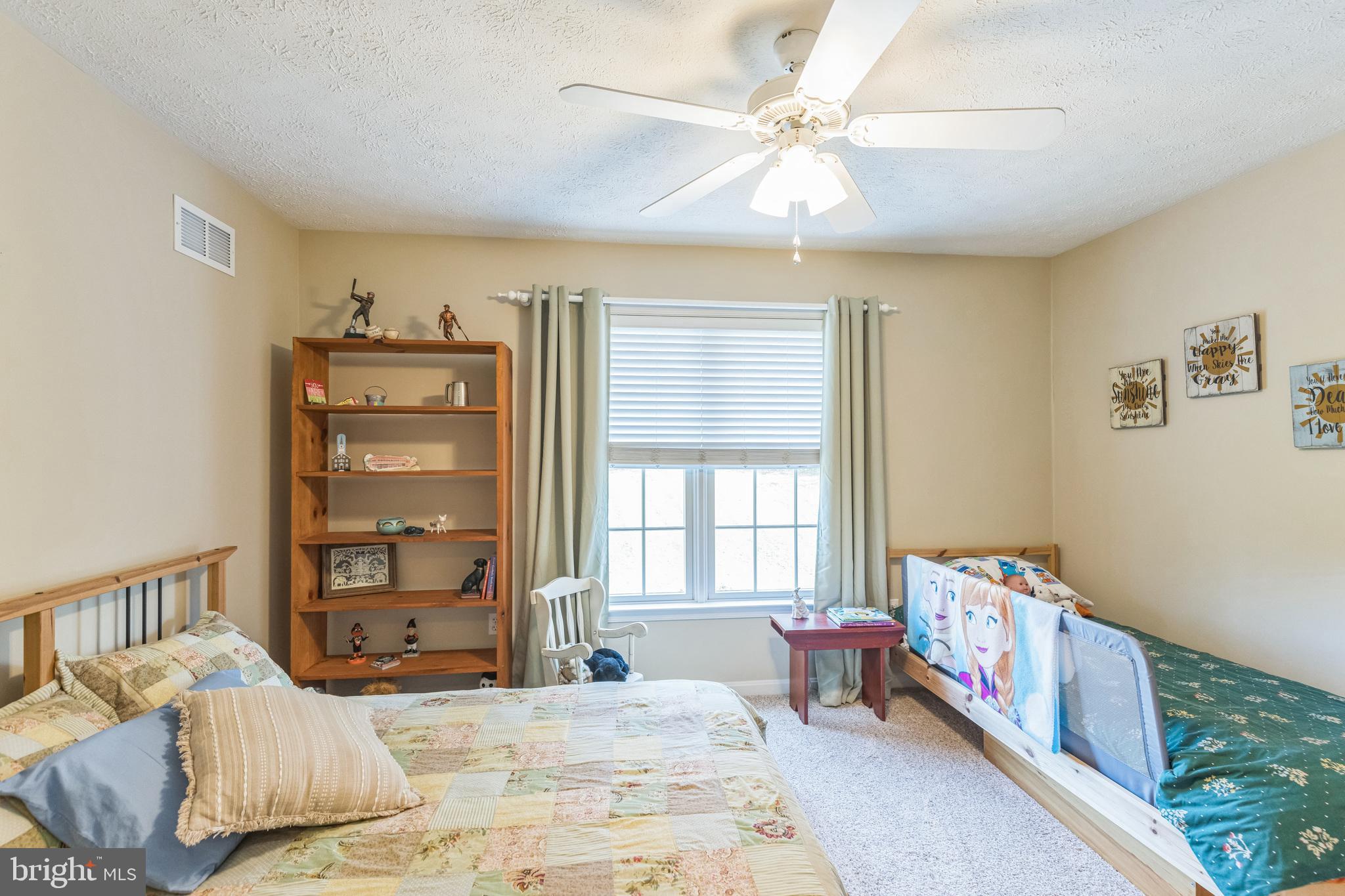 2734 Old Fort Schoolhouse Road Westminster, MD 21157 - Photo 26 of 44 a bedroom with furniture and a window