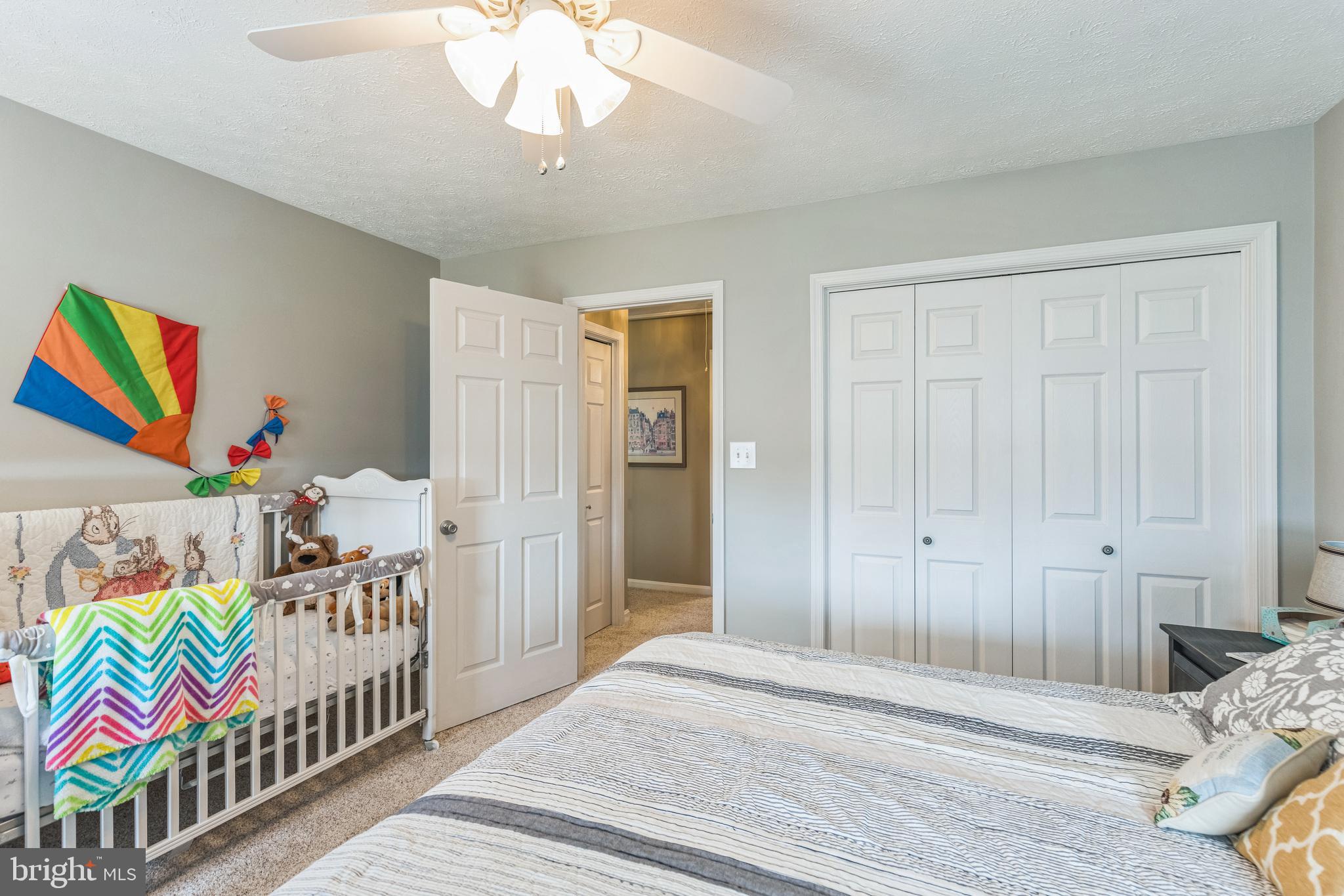 2734 Old Fort Schoolhouse Road Westminster, MD 21157 - Photo 30 of 44 a bedroom with furniture and baby crib