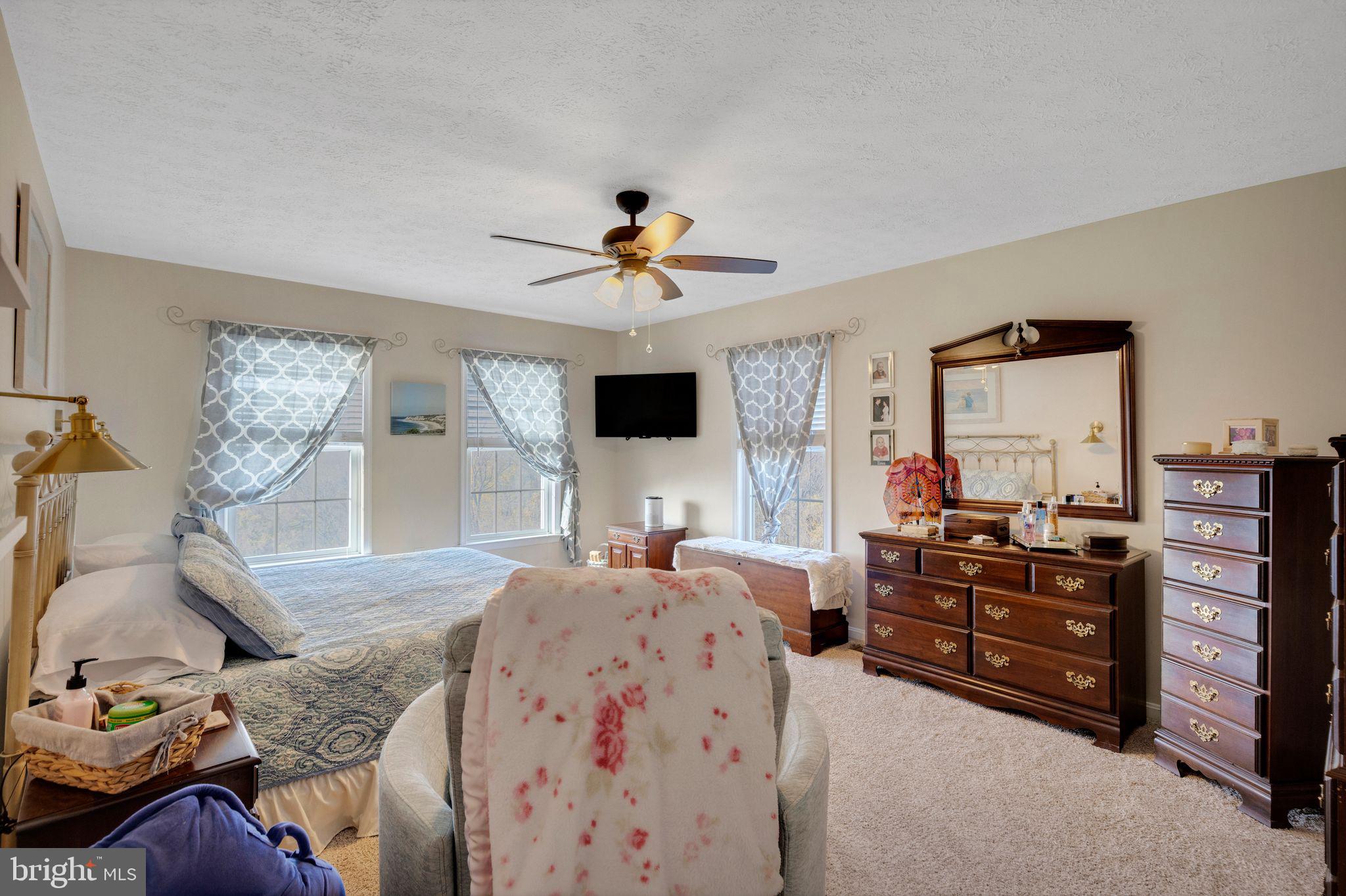 2734 Old Fort Schoolhouse Road Westminster, MD 21157 - Photo 31 of 44 a living room with furniture and a flat screen tv