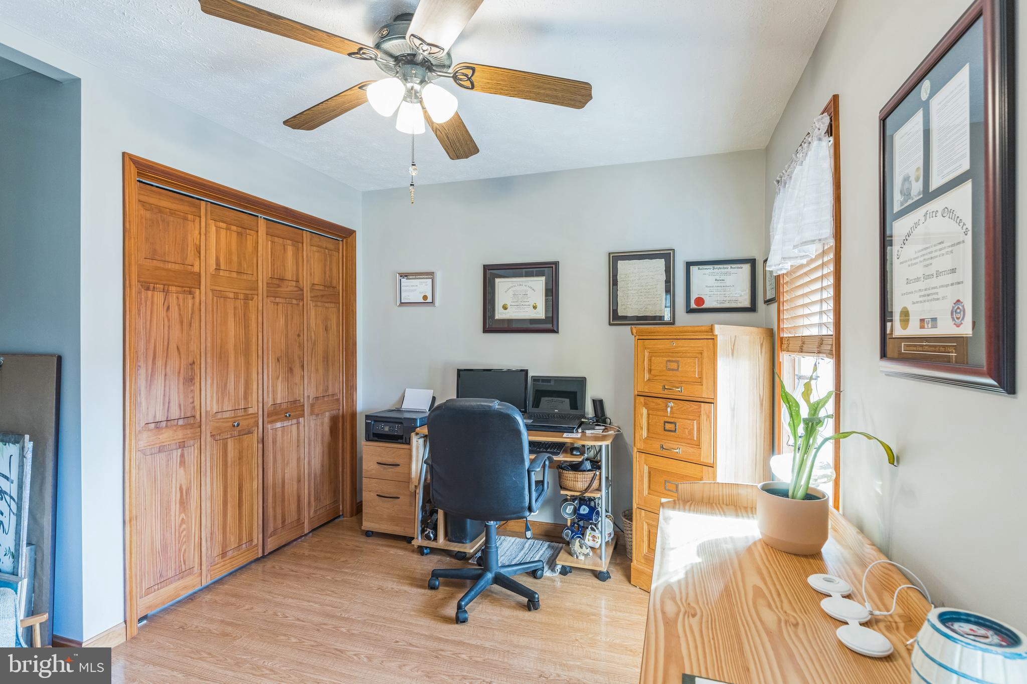 2734 Old Fort Schoolhouse Road Westminster, MD 21157 - Photo 33 of 44 a view of a workspace with furniture and a window