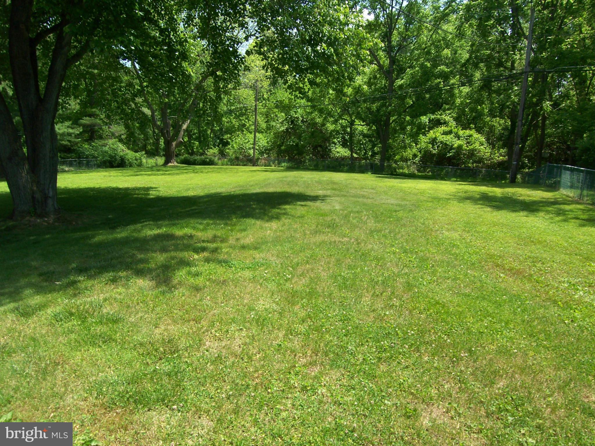 309 Highmeadow Road Reisterstown, MD 21136 - Photo 8 of 22 Large Level Backyard facing woods