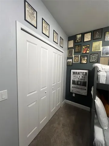 a view of a livingroom with shelves