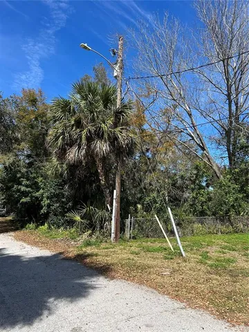a view of a yard with a slide