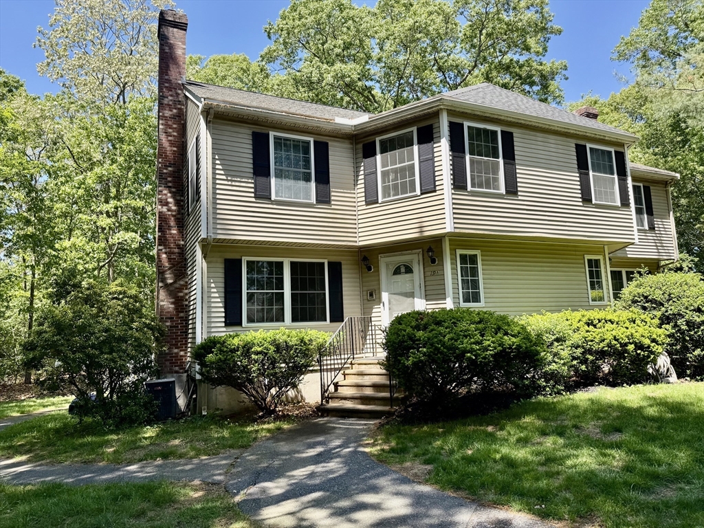 19 Fairview Road, Unit A Framingham, MA 01702 - Photo 1 of 28 a front view of a house with a yard