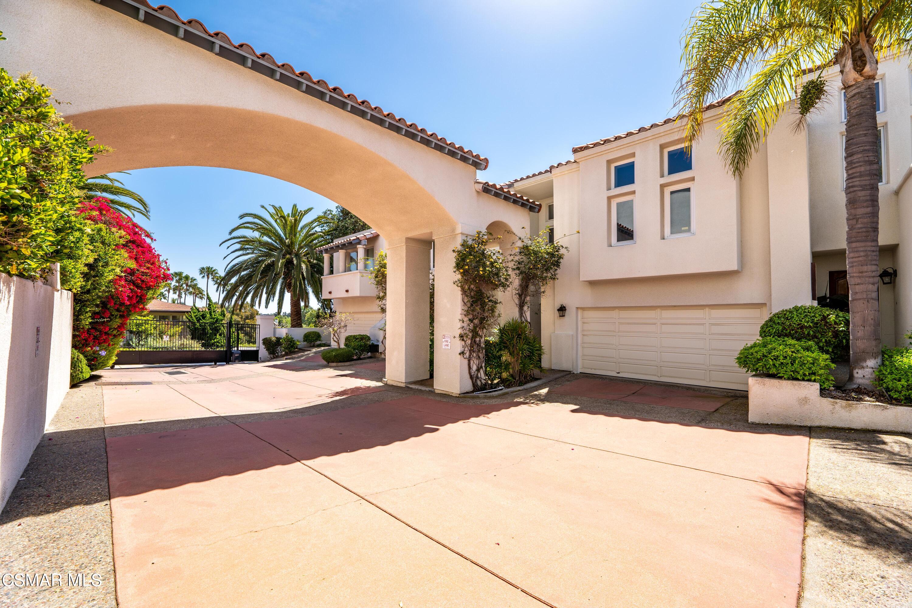 a front view of house with small garden