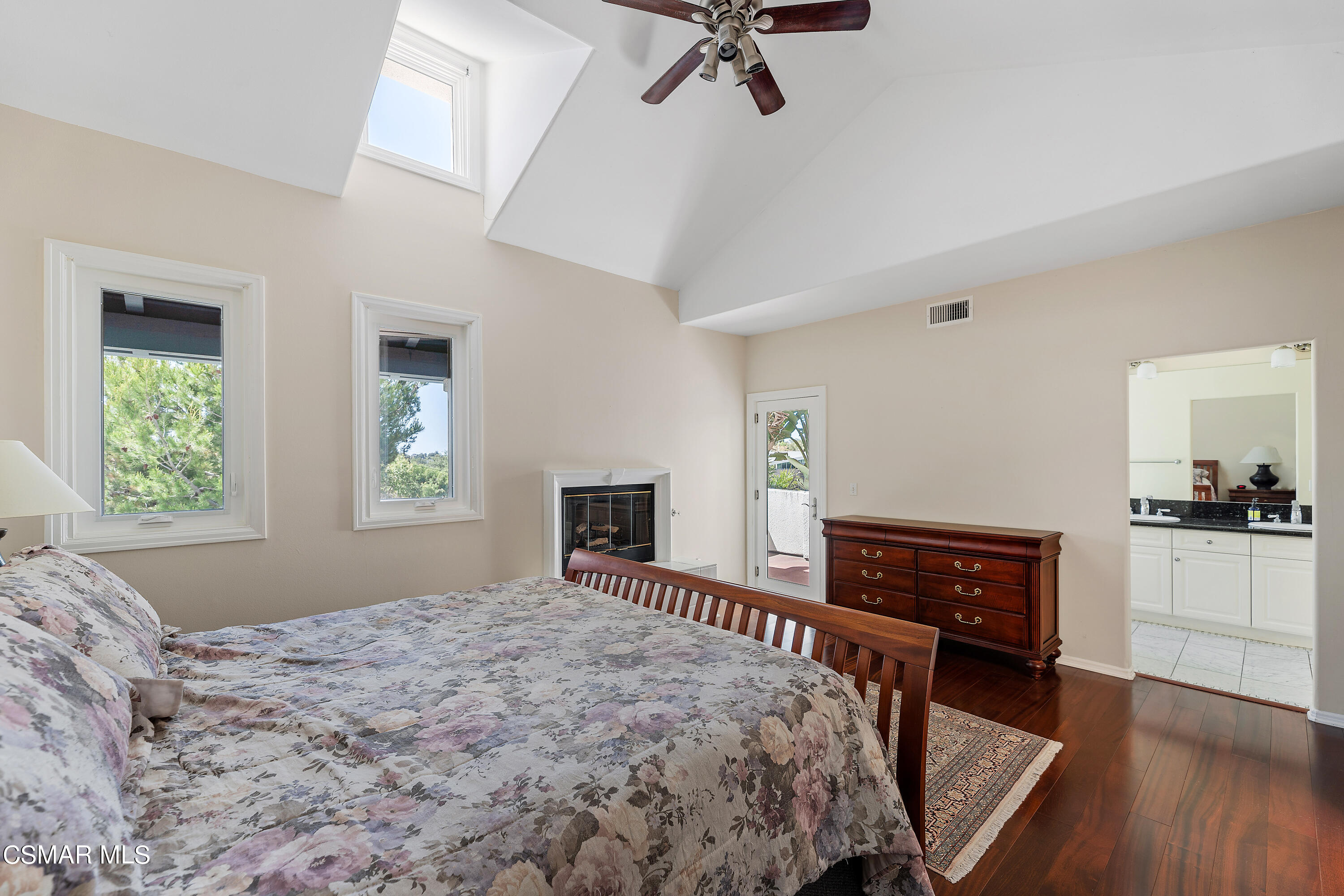6435 Zumirez Drive, Unit 15 Malibu, CA 90265 - Photo 22 of 38 a bedroom with a bed and a dresser