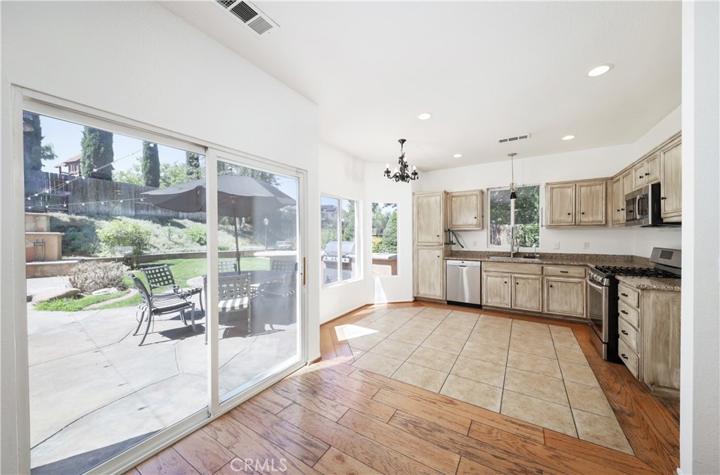 110 Clearview Court Tehachapi, CA 93561 - Photo 42 of 49 SLIDE OFF KITCHEN TO BACKYARD