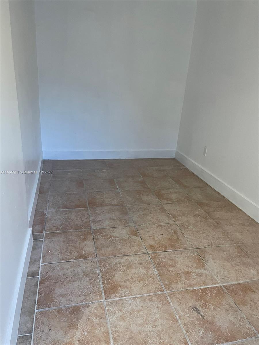 746 Northeast 80th Street, Unit GAR Miami, FL 33138 - Photo 4 of 14 a view of a room