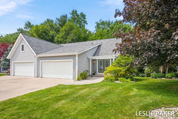 $362,900 | 14806 Woodswalk Court, Unit 18, Spring Lake, MI 49456