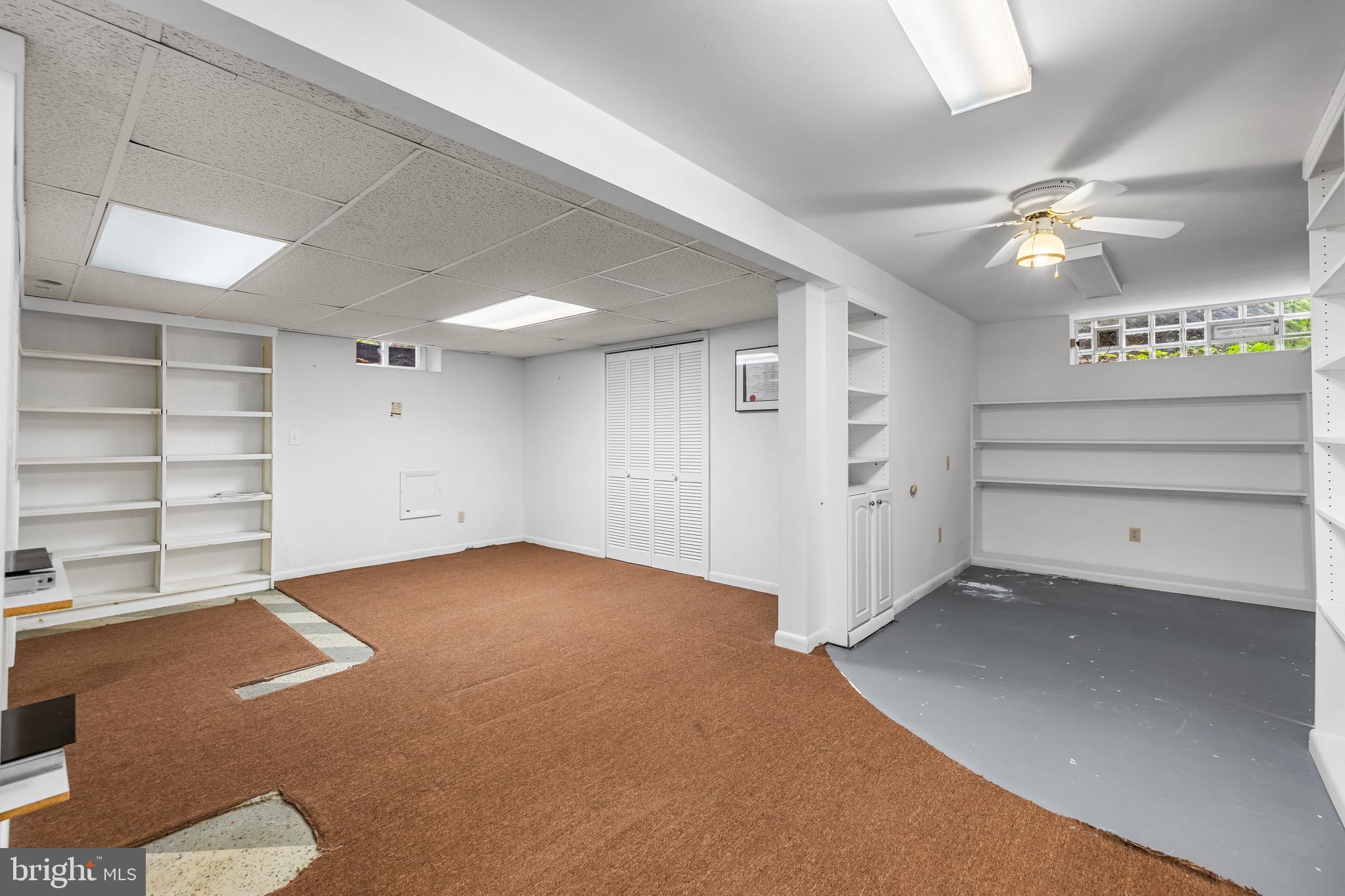1304 Heather Hill Road Baltimore, MD 21239 - Photo 29 of 40 a view of an empty room with a cabinet