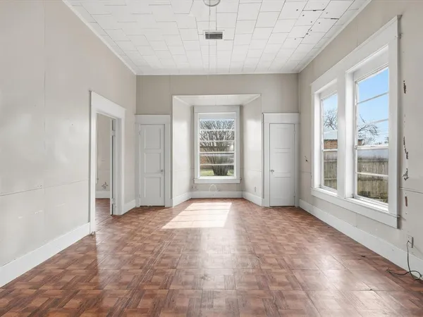 a view of an empty room with a window