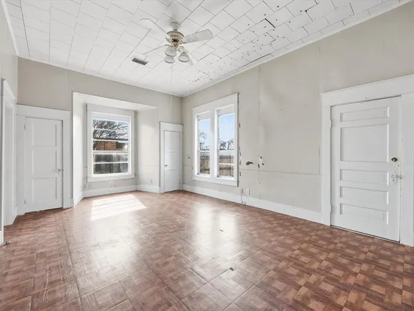 a view of an empty room with a window