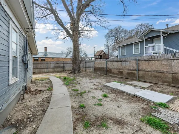 a view of a backyard with a trees