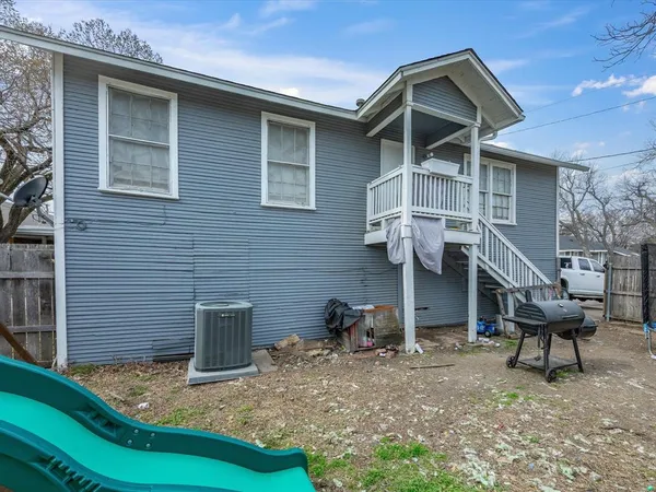 a front view of a house with patio