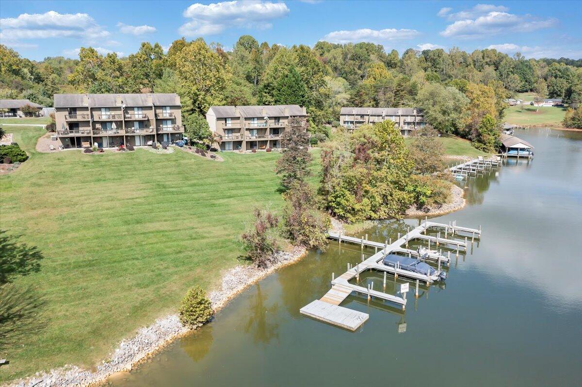 301 Harbor Ridge Drive Goodview, VA 24095 - Photo 1 of 56 a view of a lake with a mountain